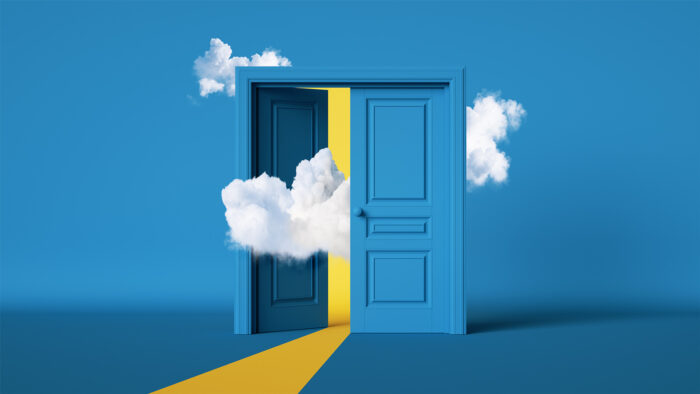 Blue doorway and clouds leading to a yellow room