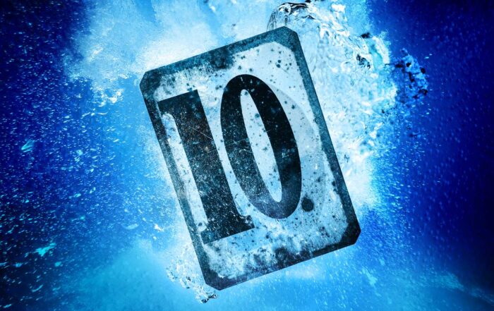 Metal plate sign with number ten sinking underwater