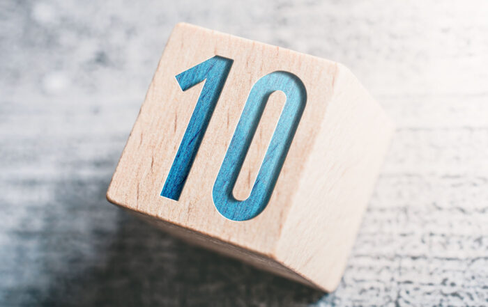 Wooden block with blue number ten