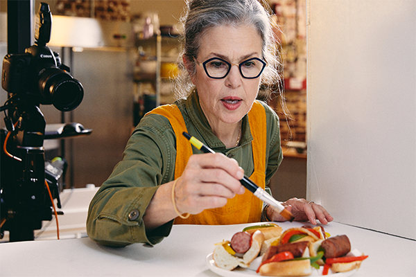 Photographer stylizing food for a photo shoot