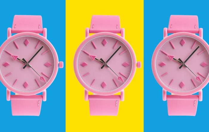 Three pink analog watches